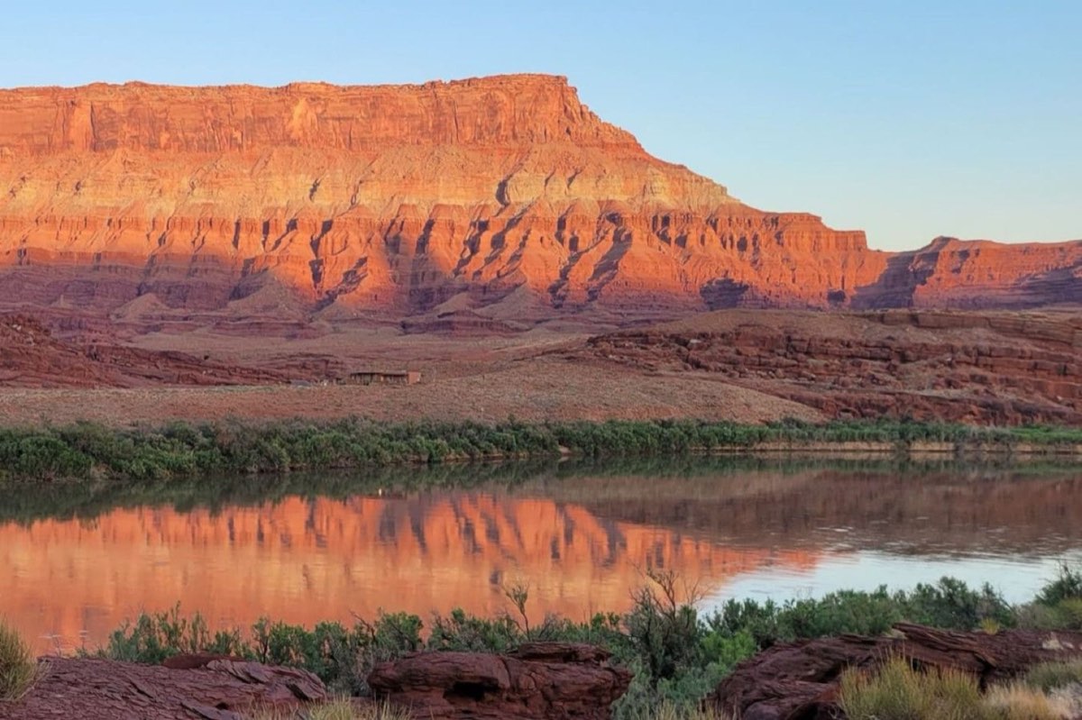 Red rock reflected in the Colorado at the end of the day